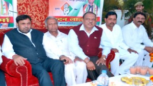 Ex-minister Mula Ram, MP Madan Lal, M L Kashyap and others at an election meeting in Jammu on Sunday.