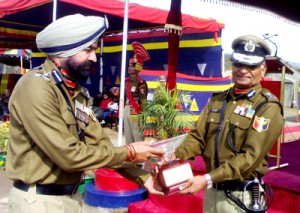 IG, S S Tomar awarding medals during a passing out parade at STC Udhampur.