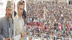 Union Minister Ghulam Nabi Azad and Chief Minister Omar Abdullah addressing an election rally at Ramsu on Wednesday.
