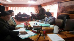 Aga Syed Kazim Sabri filing his nomination papers before DC Leh Simrandeep Singh on Friday.