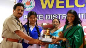 Trophy being presented to winners during prize distribution function at Police Public School, Miran Sahib in Jammu.