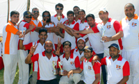 Jubilant Media XI posing for a group photograph after clinching victory over Aircel XI in Jammu.