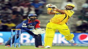CSK batsman Suresh Raina lifting the ball during an IPL-7 match against Delhi Daredevils in Abu Dhabi on Monday.