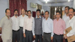 Members of BBIA Jammu led by Annil Suri at a meeting with Joint Development Commissioner MSME, S R Samuel in Jammu on Wednesday.