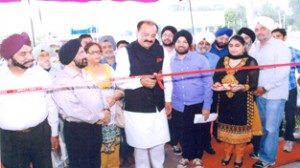 Surjit Singh Slathia, MLA inaugurating Speed Car Wash unit at Kunjwani on Friday.