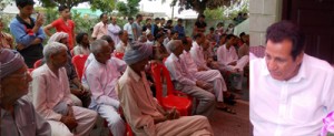 Former Minister R S Chib addressing a public meeting in Hiranagar on Monday.