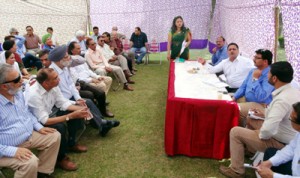 JMC Commissioner, Kiran Wattal and others taking stock of people’s grievances in a meeting at Jammu.