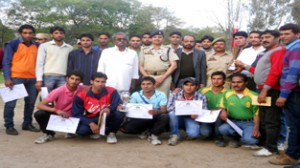 Winners of Open Volleyball Tournament posing for group photograph at Mendhar on Tuesday.
