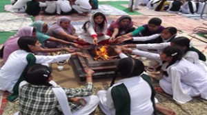 Students of Humanity Public School during Mahayagya organized to celebrate foundation day.
