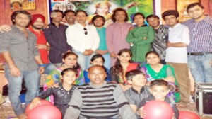 Artists posing alongwith the dignitaries during Musical Evening organized by Saptak Sangeet Niketan, Jammu.