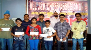 Winners posing alongwith the office bearers of J&K Chess Association.
