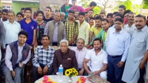 Janak Raj Gupta alongwith Congress party supporters during meeting at Katra on Thursday.