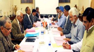 Governor N N Vohra chairing Kashmir University Council meeting on Wednesday.