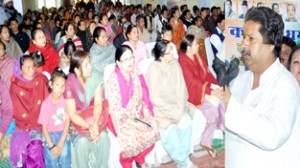 Minister for Housing, Raman Bhalla addressing public meeting on Monday.