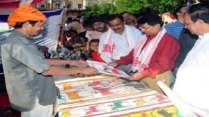 Divisional Commissioner Shantmanu and others during craft exhibition at Mubarak Mandi on Sunday.