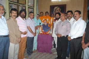 NC leaders and workers paying tributes to Bodh Raj Bali at Sher-i-Kashmir Bhawan on Monday.