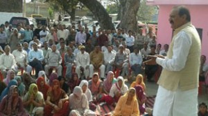 MLA Surjeet Singh Slathia addressing an election meeting in Kathua district on Sunday.