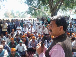 Jugal Kishore Sharma addressing election meeting at Akhnoor on Tuesday.