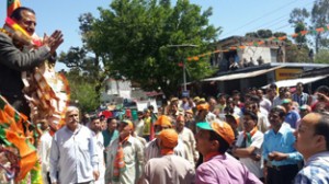 Dr Jitendra Singh addressing a road -show in Billawar on Thursday.