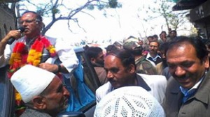 Senior PDP leader, Tariq Hameed Karra addressing an election rally at Budgam on Thursday.