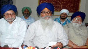 Sikh leaders interacting with media persons at Jammu on Saturday. -Excelsior/ Rakesh