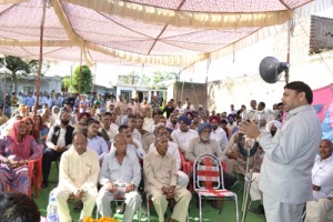 MP Madan Lal Sharma addressing public meeting in Jammu on Friday.