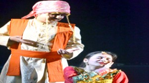 A scene from the Dogri play 'Ghumayee' presented by Natrang at Police Auditorium, Jammu.