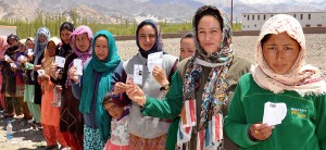Women in Leh display their voter cards as they queue up to cast vote on Wednesday. Another pic on page 4.