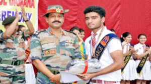 Dignitaries and members of Students Council during investiture ceremony at APS Damana in Jammu.