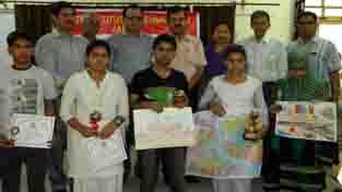 Winners of Painting Competition posing alongwith dignitaries in Jammu on Saturday.