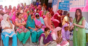 Nidhi Anand, Branch Head, SBI Swankha interacting with women on Wednesday.
