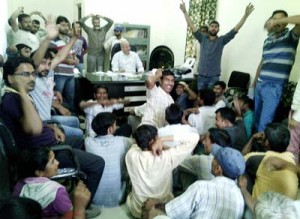 Factory workers raising slogans during protest at Samba. -Excelsior/ Gautam