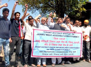 Sunil Dimple along with others during a protest in Jammu on Wednesday