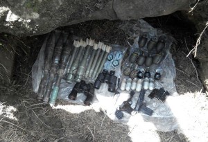 Arms and ammunition recovered from a hideout at Handwara. 	—Excelsior Aabid Nabi