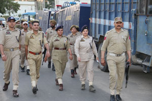 Policemen during Route March organized by JKAP in Jammu.