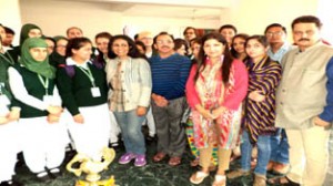 Artists posing for a group photograph.