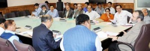 Chief Secretary Mohd Iqbal Khandey chairing a meeting at Srinagar on Wednesday.