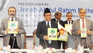 Minister for Finance, Abdul Rahim Rather and others releasing Financial Literary Guide during SLBC meeting at Srinagar on Thursday.