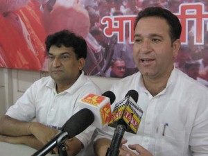 Sunil Sharma talking to reporters at Jammu on Wednesday. —Excelsior/Rakesh