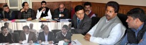 Minister for Horticulture, Raman Bhalla and MoS Horticulture Nazir Ahmad Gurezi chairing a meeting at Srinagar on Wednesday.