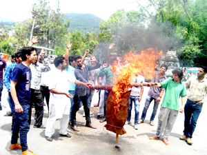 People demonstrating against Government and Education Department at Udhampur on Sunday.