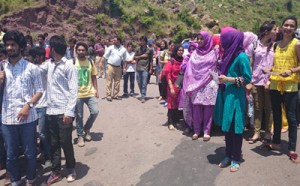 Students and faculty of BGSBU during rally at Rajouri on Thursday.