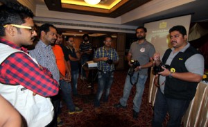 Experts from Nikon India sharing the concepts of digital photography and camera operations with photography enthusiasts, during a workshop at Jammu .