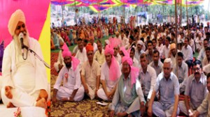 Gurdeep Giri Ji Maharaj delivering religious sermons at Jammu on Monday.