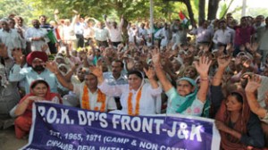 Displaced persons from PoK staging protest in Jammu on Saturday.                —Excelsior/Rakesh