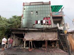 A view of Hotel Neelam extensively damaged in fire near General Bus Stand Jammu on Saturday.—Excelsior/Rakesh