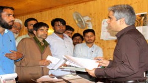 Political Secretary to Chief Minister Tanvir Sadiq interacting with a deputation on Wednesday.