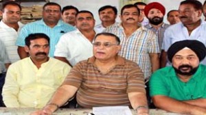 PPEU activists at a meeting at Jammu on Tuesday. -Excelsior/Rakesh