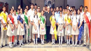 The students council of KC International posing alongwith the dignitaries during Investiture Ceremony on Saturday.