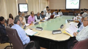 Chief Secretary, Mohammad Iqbal Khandey chairing a meeting at Srinagar on Monday.